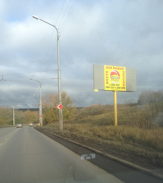 Реклама на Наружных конструкциях Билборд на ул. Суворова,съезд к Байновскому мосту, сторона А